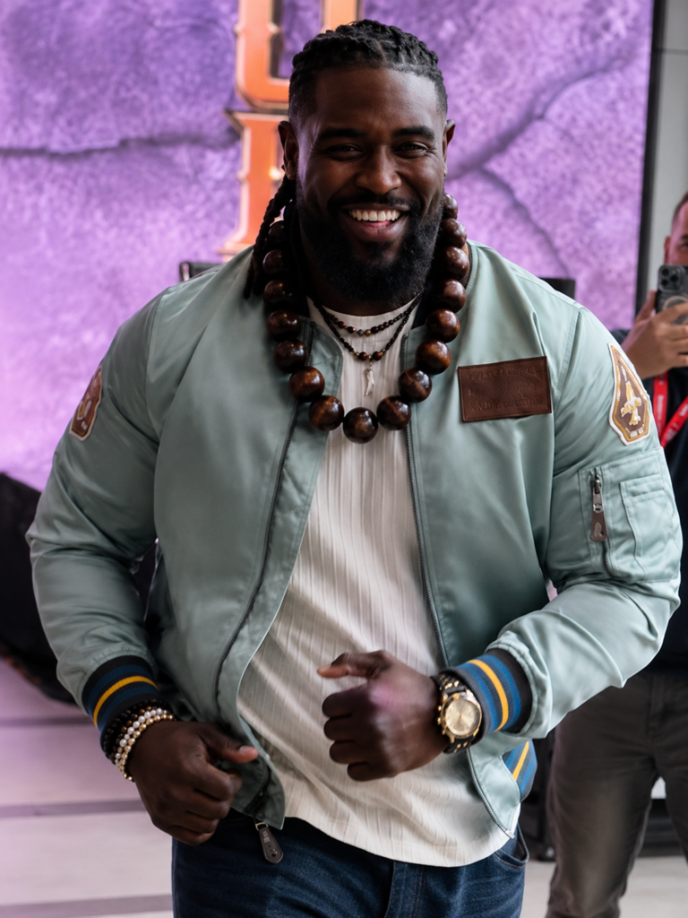 WWE 2K26 Preview Event Oba Femi Light Blue Bomber Jacket