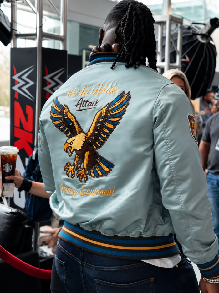 WWE 2K26 Preview Event Oba Femi Light Blue Bomber Jacket