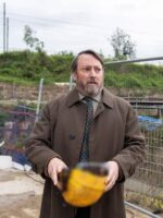 Ludwig-Season-2-David-Mitchell-Brown-Coat