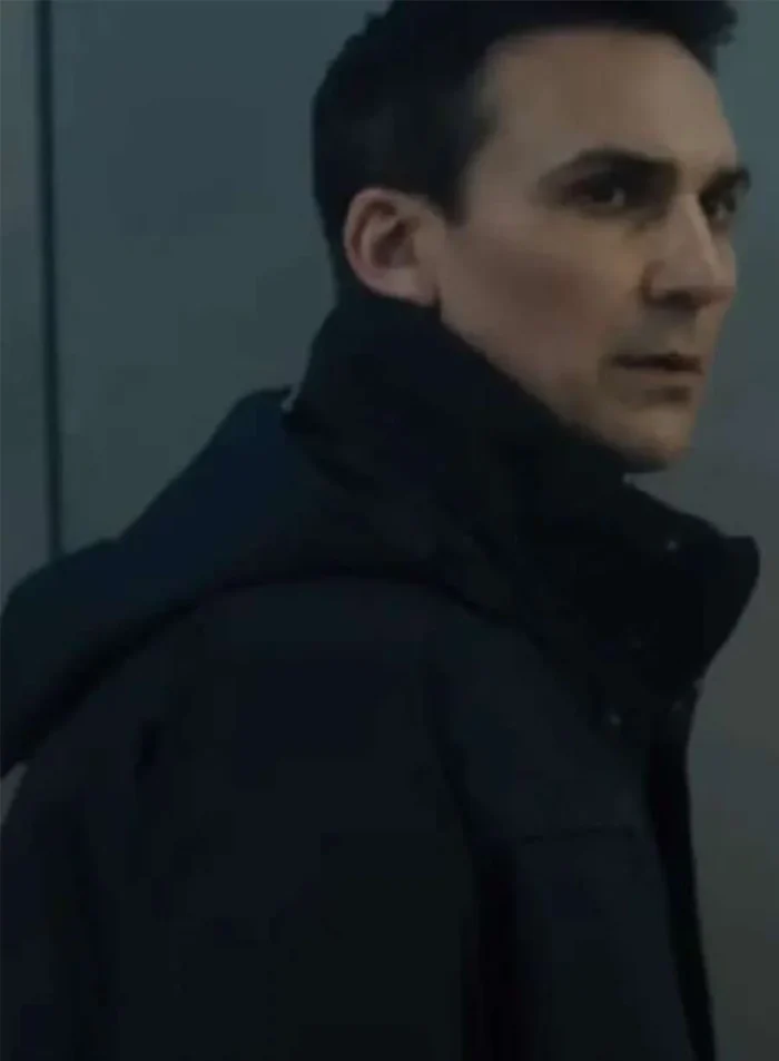 disclosure-day-2026-agent-diaz-black-jacket-man